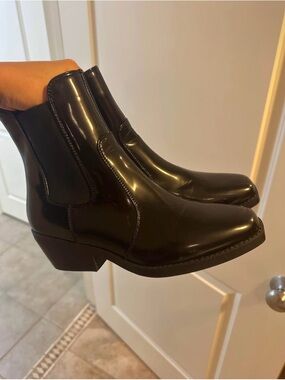 Black vinyl boots